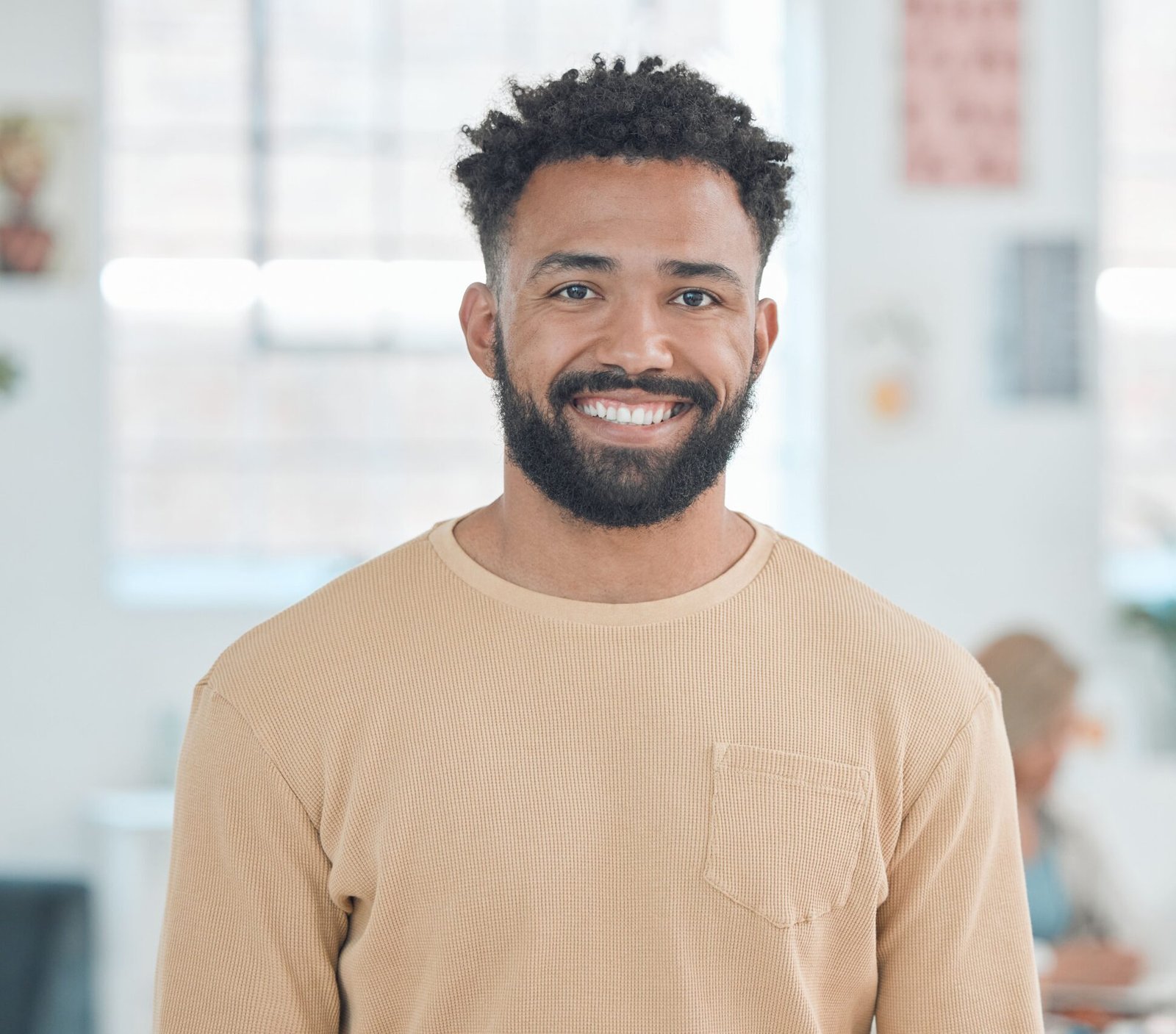 portrait-of-a-cheerful-mixed-race-businessman-stan-2024-10-22-16-12-14-utc-2-scaled-e1740353798190.jpg